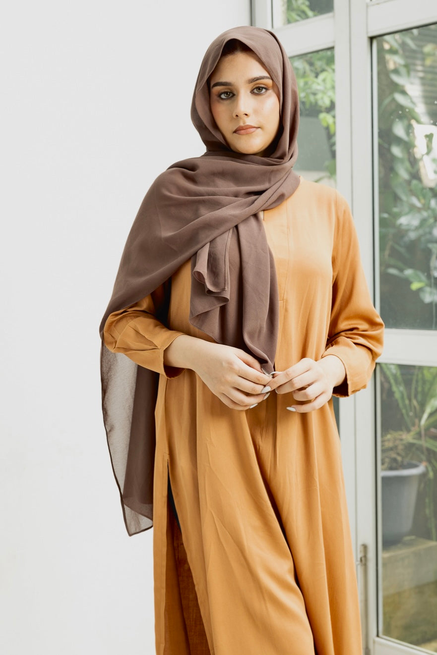 Naura- Elegant, long, golden yellow top with slit.