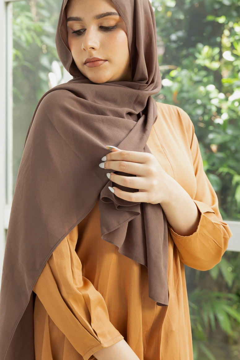 Naura- Elegant, long, golden yellow top with slit.