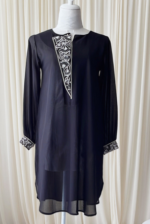 Embroidered party wear top with pearl accents