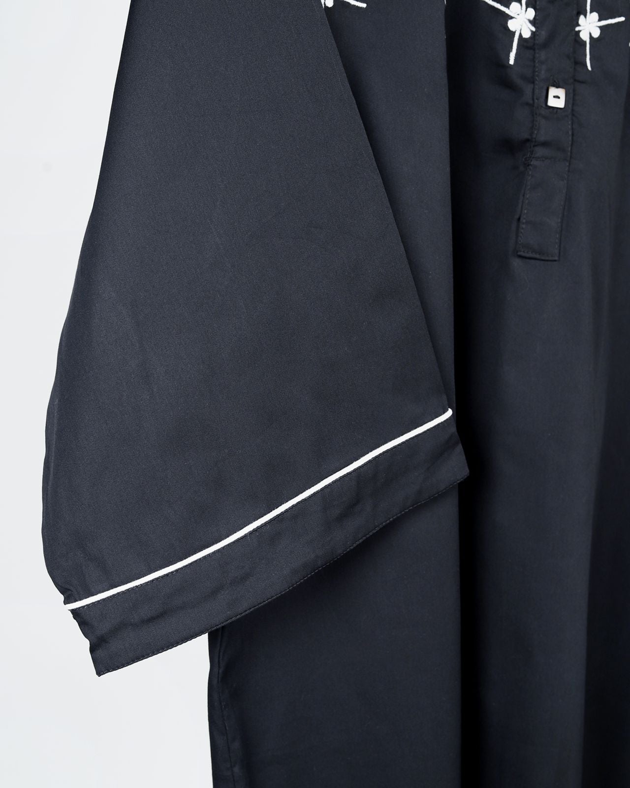 Black Top with Contrast Embroidery | Elegant Modest Fashion with Bold Details