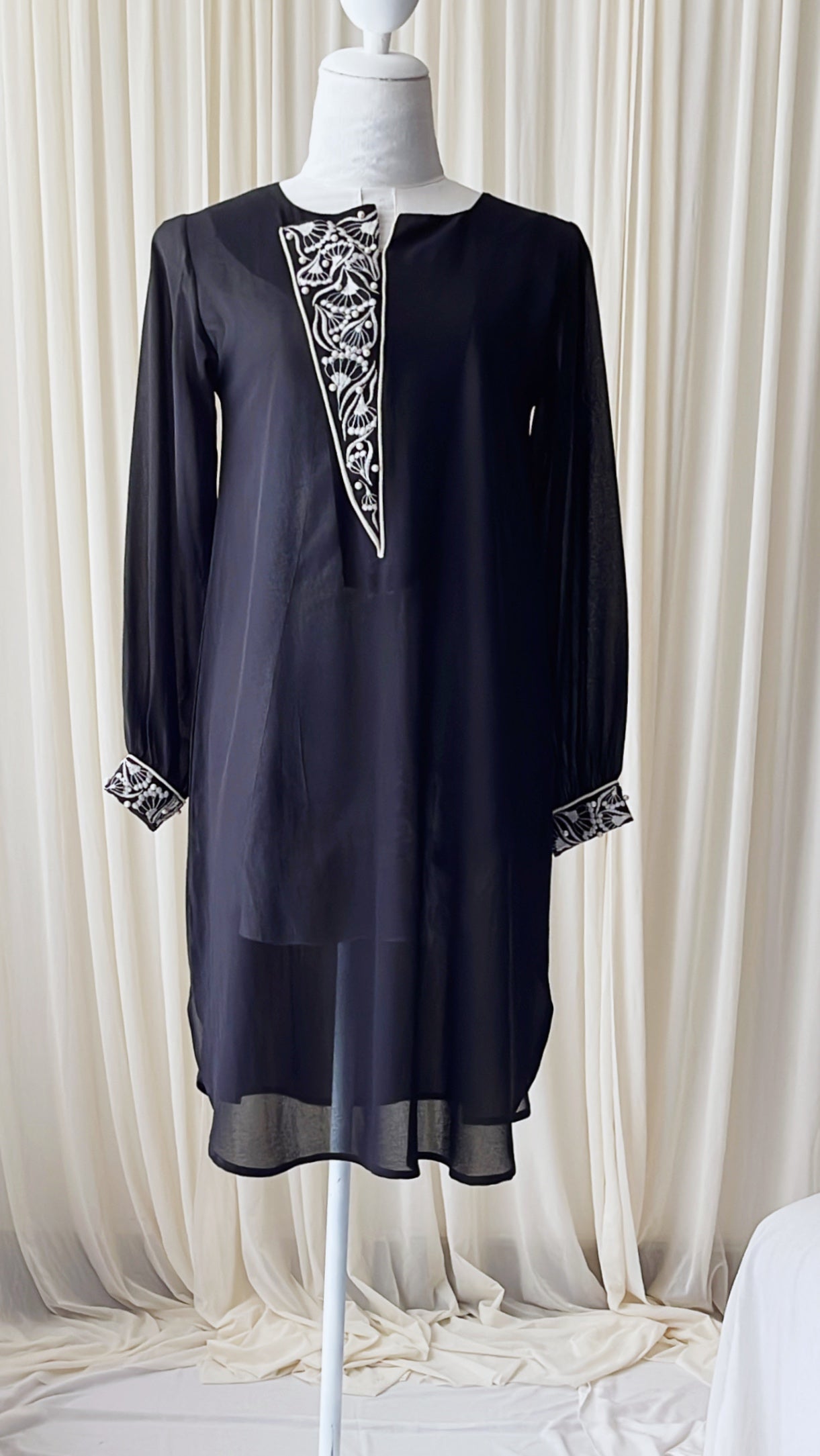 Embroidered party wear top with pearl accents