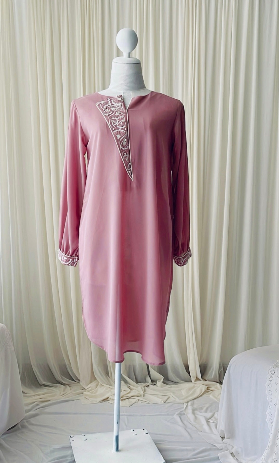 Embroidered party wear top with pearl accents