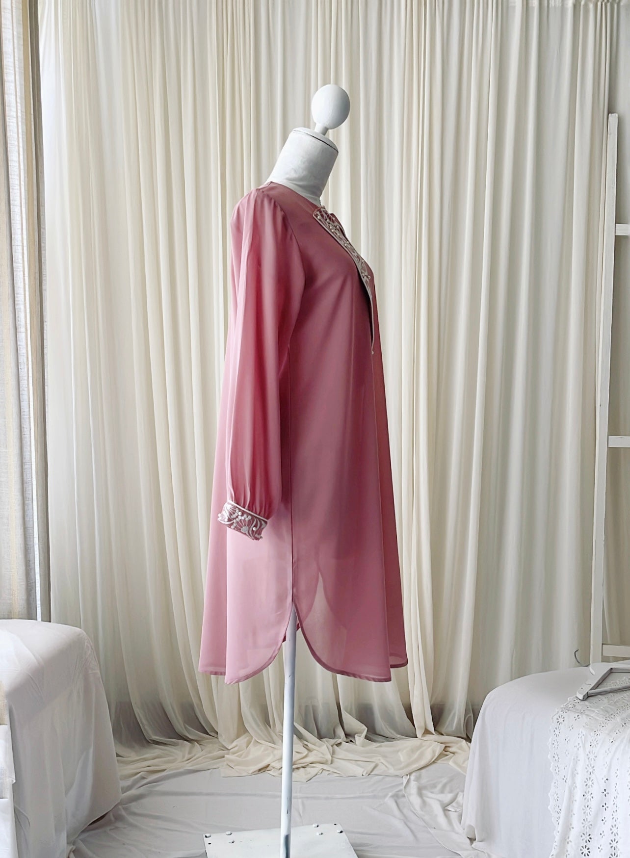 Embroidered party wear top with pearl accents