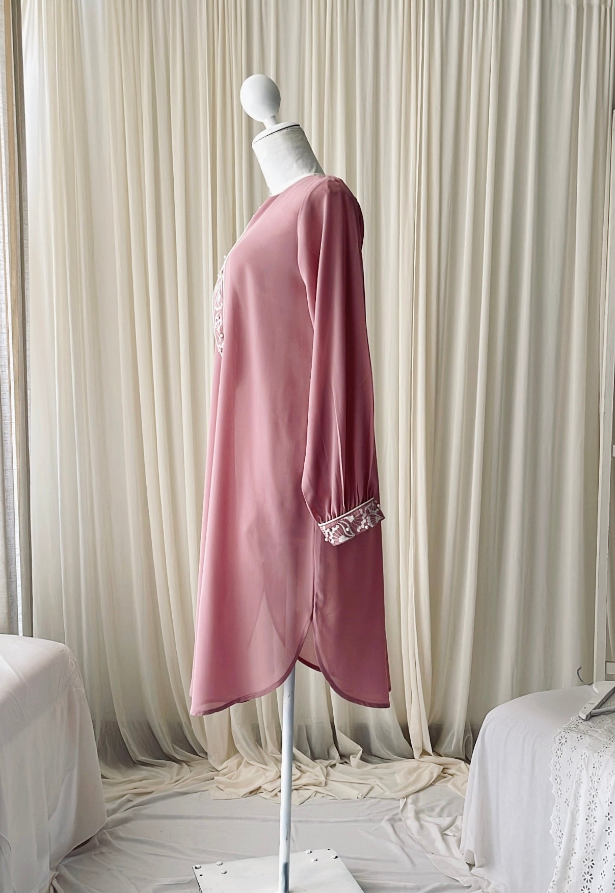 Embroidered party wear top with pearl accents