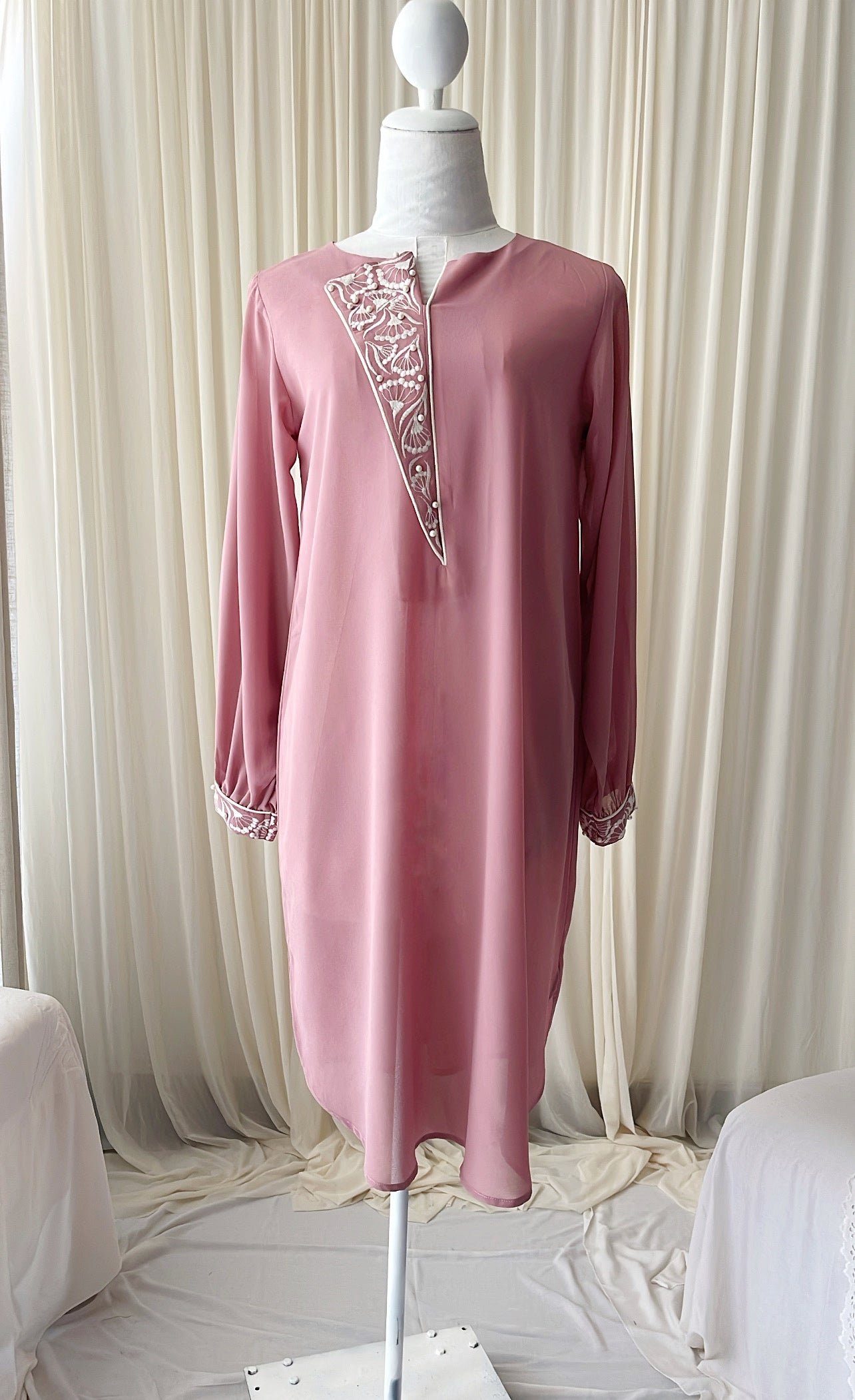 Embroidered party wear top with pearl accents