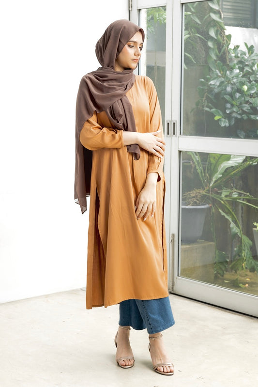 Naura- Elegant, long, golden yellow top with slit.