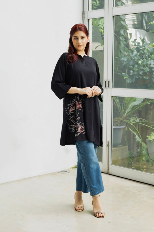 Tropical Heat- Black cotton top with floral embroidered detail.