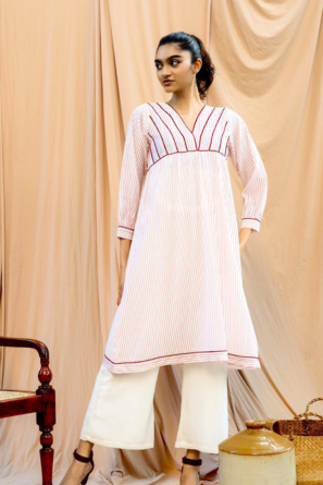 Striped cotton top with red piping details